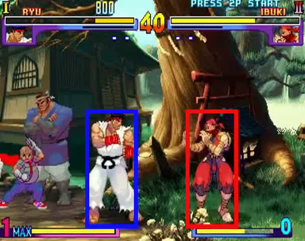 Frame from Street Fighter showing both characters with the player highlighted in blue and the NPC highlighted in red